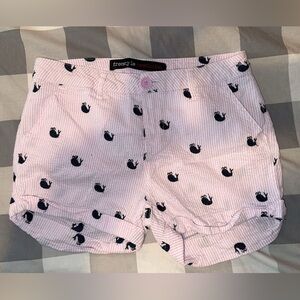Pink seersucker shorts with navy blue whales